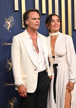 (L-R) Walton Goggins and Nadia Conners arrive for the 77th annual Primetime Emmy Awards at the Peacock Theater in Los Angeles on Sunday, September 14, 2025.  LAP20250914280 CHISxCHEW