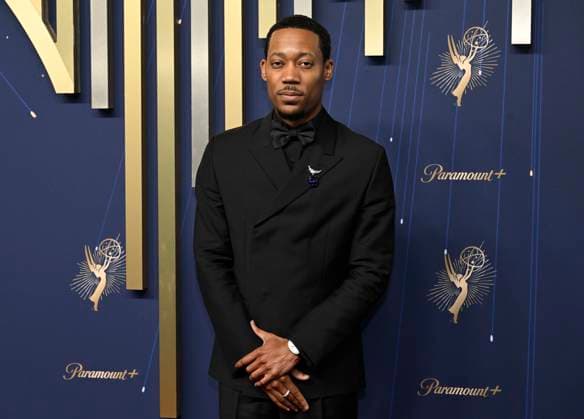 Tyler James Williams arrives for the 77th annual Primetime Emmy Awards at the Peacock Theater in Los Angeles on Sunday, September 14, 2025.  LAP20250914789 JohnxMcCoy