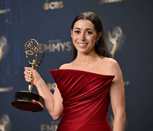 Cristin Milioti holds the Emmy for Lead Actress in a Limited or Anthology Series or Movie for The Penguin, backstage during the 77th annual Primetime Emmy Awards at the Peacock Theater in Los Angeles on Sunday, September 14, 2025.  LAP20250914289 CHISxCHEW