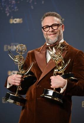 Seth Rogen holds the Emmys for Outstanding Writing for a Comedy Series, Outstanding Directing for a Comedy Series, Outstanding Lead Actor in a Comedy Series and Outstanding Comedy Series for The Studio, backstage during the 77th annual Primetime Emmy Awards at the Peacock Theater in Los Angeles on Sunday, September 14, 2025.  LAP20250914293 CHISxCHEW
