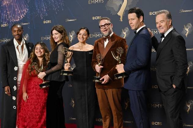 Seth Rogen (C) holds the Emmy for Outstanding Writing for a Comedy Series, Outstanding Directing for a Comedy Series, Outstanding Lead Actor in a Comedy Series and Outstanding Comedy Series for The Studio, backstage during the 77th annual Primetime Emmy Awards at the Peacock Theater in Los Angeles on Sunday, September 14, 2025.  LAP20250914303 CHISxCHEW