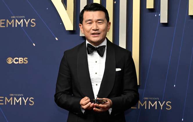Ronny Chieng arrives for the 77th annual Primetime Emmy Awards at the Peacock Theater in Los Angeles on Sunday, September 14, 2025.  LAP20250914810 JohnxMcCoy