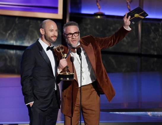 Evan Goldberg (L) and Seth Rogen accept the Outstanding Directing For a Comedy Series award for The Studio onstage at the 77th annual Primetime Emmy Awards at the Peacock Theater in Los Angeles on Sunday, September 14, 2025.  LAP20250914915 JIMxRUYMEN