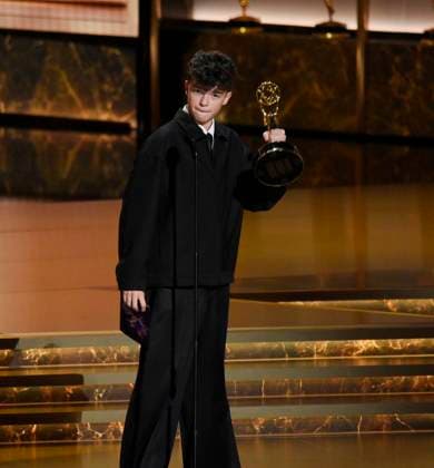 Owen Cooper accepts the Outstanding Supporting Actor in a Limited or Anthology Series or Movie award for Adolescence onstage at the 77th annual Primetime Emmy Awards at the Peacock Theater in Los Angeles on Sunday, September 14, 2025.  LAP20250914912 JIMxRUYMEN