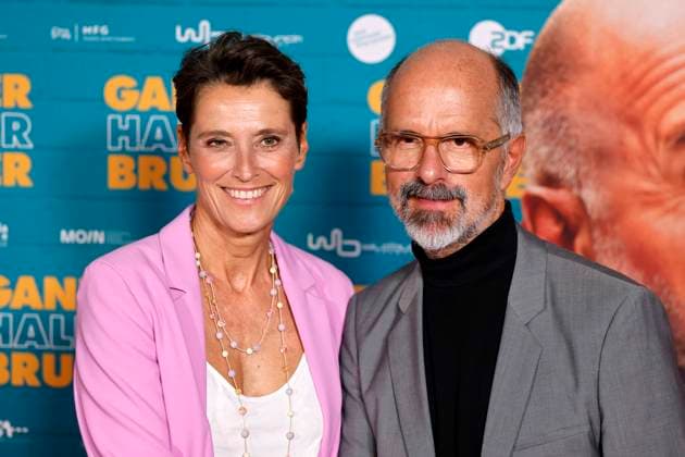 Actor Christoph Maria Herbst and his wife Gisi Herbst at the premiere of the movie Ganzer Halber Bruder at Cinedom Cologne Cologne, 15 09 2025 NRW Germany Copyright: xChristophxHardtx