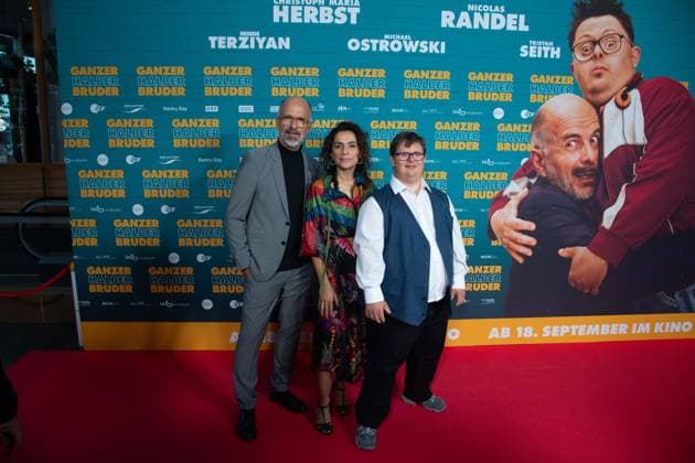 from left Christoph Maria HERBST, actor, Sesede TERZIYAN, actress, Nicolas Nico RANDEL, actor, red carpet, red carpet show, arrival, film premiere GANZER HALBER BRUDER on 15 09 2025 at the Cinedom cinema in Cologne,