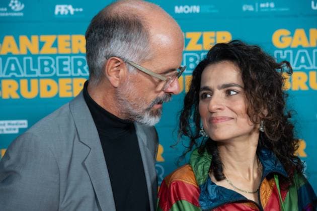 from left Christoph Maria HERBST, actor, Sesede TERZIYAN, actress, red carpet, red carpet show, arrival, film premiere GANZER HALBER BRUDER on 15 09 2025 at the Cinedom cinema in Cologne,