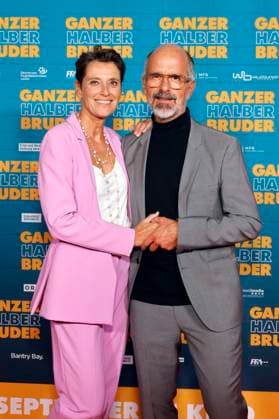 Actor Christoph Maria Herbst and his wife Gisi Herbst at the premiere of the movie Ganzer Halber Bruder at Cinedom Cologne Cologne, 15 09 2025 NRW Germany Copyright: xChristophxHardtx