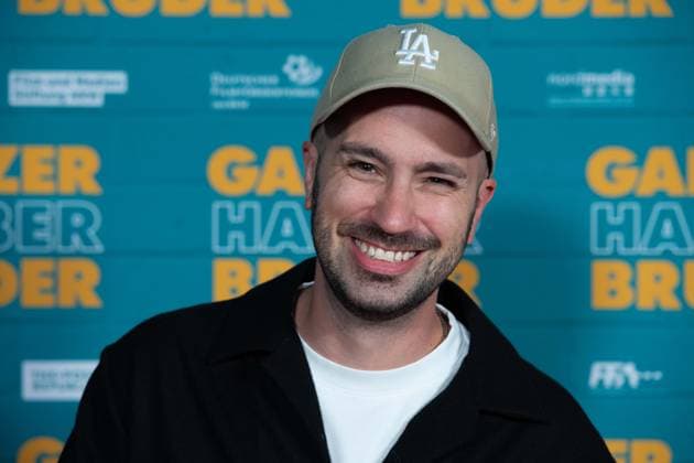 Dominik PORSCHEN, presenter, red carpet, red carpet show, arrival, film premiere GANZER HALBER BRUDER on 15 09 2025 at the Cinedom cinema in Cologne,