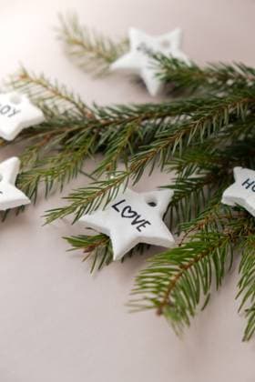 Christmas star with word LOVE Group of air dry clay handmade Christmas decor on beige background. Children air dry clay activity handicraft idea. Preparing for Christmas holiday decorating. Modern organic design minimalistic plastic free sustainable Christmas star with word LOVE Group of air dry clay handmade Christmas decor on beige background. Children air dry clay activity handicraft idea. Preparing for Christmas holiday decorating. Modern organic design minimalistic plastic free sustainable decor, 61121070.jpg RECORD DATE NOT STATED