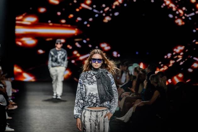 Custo Barcelona fashion show at MBFW Madrid A model during the Custo Barcelona fashion show at the 82nd edition of Mercedes Benz Fashion Week Madrid, at Ifema in Madrid, on September 19, 2025, in Madrid Spain This years edition is held from September 17 to 21 and commemorates the 40th anniversary of the catwalk Isabel Sanchíss collection for next summer 2026 is an eclectic collection, based on two fundamental pillars for the firm, the volumes of the architecture and the coexistence of Japanese culture, which explores the opposite values such as tradition and modernity, structure and fluidity, discipline and challenge and the past and future Spain.  Copyright: xRicardoxRubiox 6967625