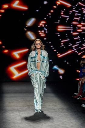 Custo Barcelona fashion show at MBFW Madrid A model during the Custo Barcelona fashion show at the 82nd edition of Mercedes Benz Fashion Week Madrid, at Ifema in Madrid, on September 19, 2025, in Madrid Spain This years edition is held from September 17 to 21 and commemorates the 40th anniversary of the catwalk Isabel Sanchíss collection for next summer 2026 is an eclectic collection, based on two fundamental pillars for the firm, the volumes of the architecture and the coexistence of Japanese culture, which explores the opposite values such as tradition and modernity, structure and fluidity, discipline and challenge and the past and future Spain.  Copyright: xRicardoxRubiox 6967629