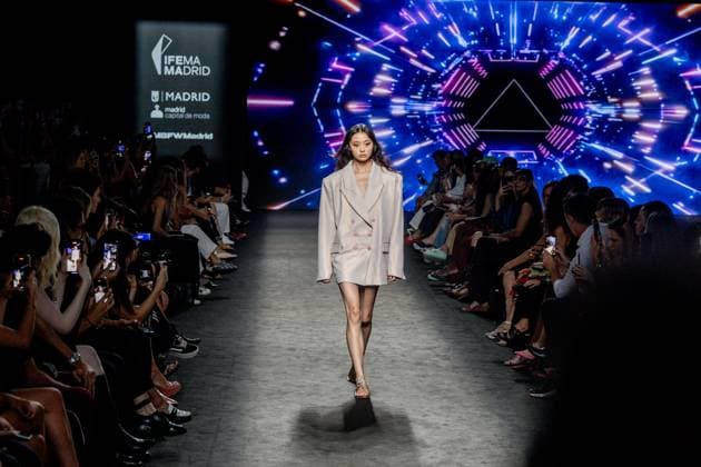 Custo Barcelona fashion show at MBFW Madrid A model during the Custo Barcelona fashion show at the 82nd edition of Mercedes Benz Fashion Week Madrid, at Ifema in Madrid, on September 19, 2025, in Madrid Spain This years edition is held from September 17 to 21 and commemorates the 40th anniversary of the catwalk Isabel Sanchíss collection for next summer 2026 is an eclectic collection, based on two fundamental pillars for the firm, the volumes of the architecture and the coexistence of Japanese culture, which explores the opposite values such as tradition and modernity, structure and fluidity, discipline and challenge and the past and future Spain.  Copyright: xRicardoxRubiox 6967638