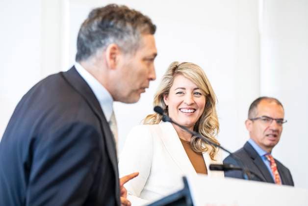 September 19, 2025, Laval, Qc, Canada: Stefan Raos, General Manager at Moderna Canada, left to right, Minister of Innovation, Science and Industry of Canada Melanie Joly and Stephane Bancel, CEO of Moderna Therapeutics, participate in an announcement at the Moderna offices in Laval, Que., on Friday, Sept. 19, 2025. Laval Canada - ZUMAc35_ 20250919_zaf_c35_076 Copyright: xChristopherxKatsarovx