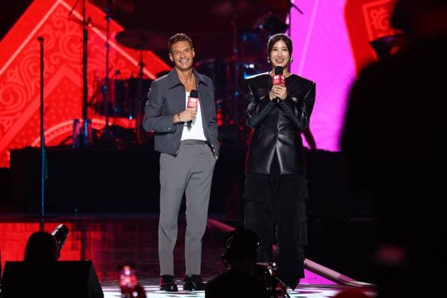(L-R) Ryan Seacrest and radio host EJAE, speak on stage during the iHeartRadio Music Festival Concerts at T-Mobile Arena in Las Vegas, Nevada on Friday, September 19, 2025.  LAV2025091920 JAMESxATOA