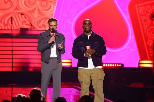 (L-R) Ryan Seacrest and Charlamagne tha God, speak on stage during the iHeartRadio Music Festival Concerts at T-Mobile Arena in Las Vegas, Nevada on Friday, September 19, 2025.  LAV2025091950 JAMESxATOA