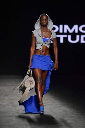 EGO Mercedes-Benz Fashion Week de Madrid - 21 Sep 2025 A model walks the runway wearing a design by Dimoni Studio during the Ego Mercedes-Benz Fashion Week de Madrid in IFErMA. Madrid Spain Copyright: xAtilanoxGarciax xSOPAxImagesx FOTO48755