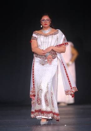 A model walks the runway wearing a creation by Krissi and Priya brand during the second annual Hats & Heels event by Rotary Trinidad and Tobago Hats & Heels event IN Port of Spain, Trinidad and Tobago, 21 September 2025. The event, which commemorates the United Nations International Day of Peace, aims to support Rotary s peacebuilding initiatives, particularly its youth empowerment project and support initiatives. Hats & Heels, a fashion show to raise funds for youth projects !ACHTUNG: NUR REDAKTIONELLE NUTZUNG!  Copyright: xAndreaxDexSilvax USA4719 20250922-55017995429_1