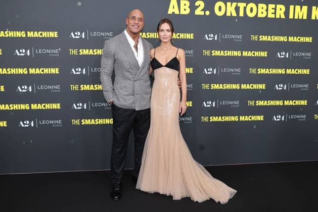 Dwayne Johnson and Emily Blunt attend The Smashing Machine premiere at Zoo Palast on September 22, 2025 in Berlin, Germany The Smashing Machine Berlin Premiere on on September 22, 2025 in Berlin, Germany