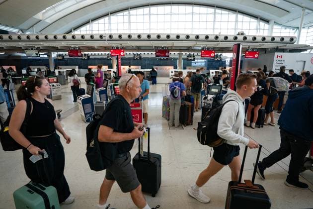 August 13, 2025, Mississauga, On, Canada: The Air Canada check-in area inside Terminal 1 of Toronto Pearson International Airport is pictured in Mississauga, Ont., on Wednesday, Aug. 13, 2025. Mississauga Canada  - ZUMAc35_ 20250813_zaf_c35_309 Copyright: xArlynxMcadoreyx