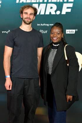Kathy Etoa with companion at the premiere of the documentary film The Talented Mr F at the cinema in theKulturBrauerei Berlin, 23 09 2025 Foto:xM.xBehrensx xFuturexImagex mister_5928