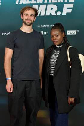 Kathy Etoa with companion at the premiere of the documentary film The Talented Mr F at the cinema in theKulturBrauerei Berlin, 23 09 2025 Foto:xM.xBehrensx xFuturexImagex mister_5929