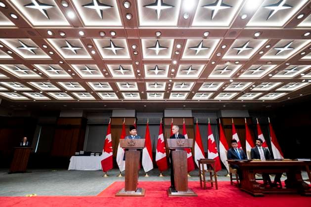September 24, 2025, Ottawa, On, Canada: President of Indonesia Prabowo Subianto, left, speaks alongside Prime Minister Mark Carney ahead of a signing ceremony during a working visit on Parliament Hill in Ottawa, on Wednesday, Sept. 24, 2025. Ottawa Canada  - ZUMAc35_ 20250924_zaf_c35_154 Copyright: xSpencerxColbyx