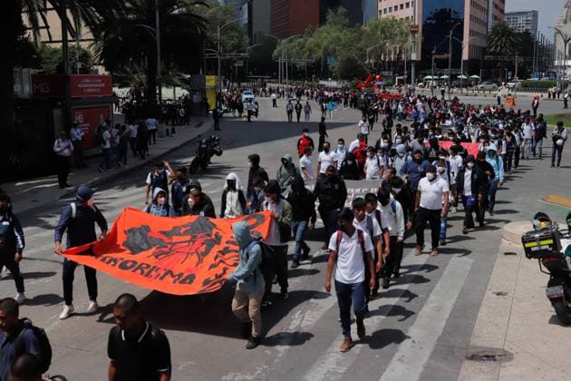 Rural students from Ayotzinapa Teacher Training School take part in a demonstration during the Ã¢â‚¬oeAyotzinapa 11 Years of Light and ShadowsÃ¢â‚¬Â day of action, demanding that the Ministry of Foreign Affairs help secure the extradition of Tomas Zeron, former head of the Criminal Investigation Agency, who is currently a fugitive in Israel. on September 24, 2025 in Mexico City, Mexico. Mexico City Mexico - ZUMAe321 20250924_zia_e321_027 Copyright: xCarlosxSantiagox