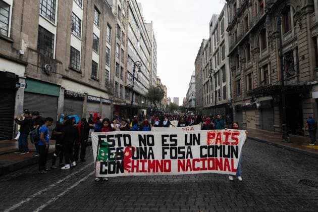 September 26, 2025, Mexico City, Mexico: On the 11th anniversary of the disappearance of 43 students from the Ayotzinapa Rural Teachers College, the mothers and fathers of the students called a rally in Mexico City. The attendees demanded justice and called on the army to release the missing information that is crucial to the ongoing investigation. Mexico City Mexico - ZUMAl178 20250926_znp_l178_030 Copyright: xCristianxLeyvax
