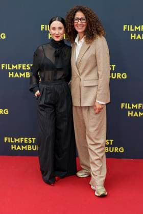 abb Sibel Kekilli Actress with Malika Rabahallah Head of Film Fest on the Red Carpet at the Cinema Premiere Premiere Film Yunan at Filmfest Hamburg at Cinemaxx Kino am Dammtor on September 27, 2025 in Hamburg Hamburg Germany