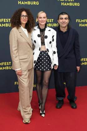 abb Malika Rabahallah, Diane Kruger, Fatih Akin as guests on the Red Carpet at the Kino Film Premiere Amrum at Filmfest Hamburg at Cinemaxx Kino am Dammtor on September 27, 2025 in Hamburg Hamburg Germany