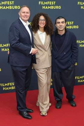 Carsten Brosda, Malika Rabahallah and Fatih Akin at the premiere of the film Amrum at the 33 Filmfest Hamburg 2025 at Cinemaxx Dammtor Hamburg, 27 09 2025 Foto:xgbrcix xFuturexImagex amrum_5890