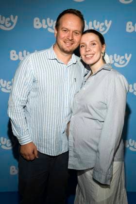 abb Adrian Graul and Maria Graziala pregnant Blond Gilmore Diaries guest on the blue carpet at the movie premiere Bluey at the cinema Kuechenspass Kollektion at CinemaxX Berlin Potsdamer Platz on September 27, 2025 in Berlin Berlin Germany
