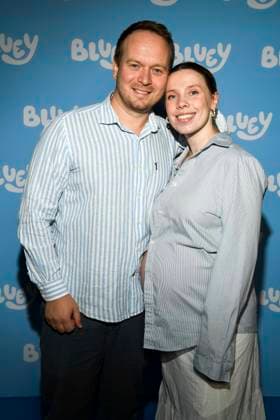 abb Adrian Graul and Maria Graziala pregnant Blond Gilmore Diaries guest on the blue carpet at the movie premiere Bluey at the cinema Kuechenspass Kollektion at CinemaxX Berlin Potsdamer Platz on September 27, 2025 in Berlin Berlin Germany