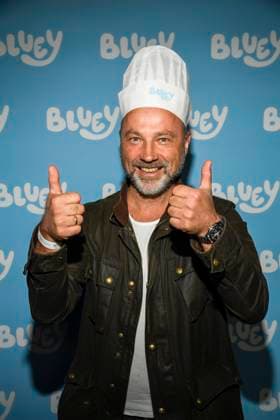abb Wolfgang Eissler director with cooking hat as guest on the blue carpet at the movie premiere Bluey in the cinema Kuechenspass Kollektion at CinemaxX Berlin Potsdamer Platz on 27 09 2025 in Berlin Berlin Germany