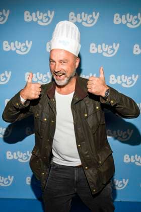 abb Wolfgang Eissler director with cooking hat as guest on the blue carpet at the movie premiere Bluey in the cinema Kuechenspass Kollektion at CinemaxX Berlin Potsdamer Platz on 27 09 2025 in Berlin Berlin Germany