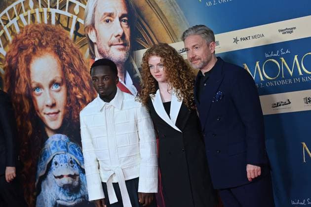 from left Araloyin Oshunrem,Alexa Goodall, Martin FREEMAN, film premiere MOMO on 128 09 2025 at the Mathaeser Kino in Munich