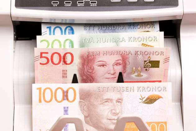 Swedish Crown in the counting machine Swedish money - Crown in the counting machine, 94882536.jpg RECORD DATE NOT STATED
