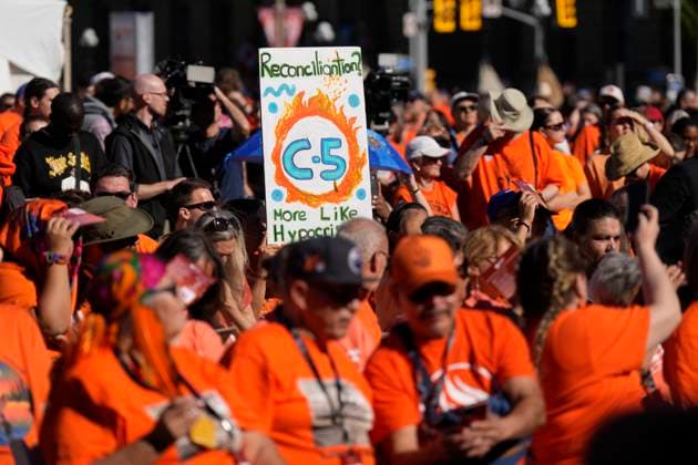 September 30, 2025, Ottawa, On, Canada: A person holds up a sign during ceremonies for the National Day for Truth and Reconciliation on Parliament Hill in Ottawa, Tuesday, Sept. 30, 2025. Ottawa Canada  - ZUMAc35_ 20250930_zaf_c35_057 Copyright: xAdrianxWyldx