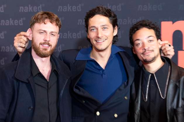 Actor Noah SAAVEDRA mi pulls his colleagues Marco GIANNI left and Aurel MERTZ right by the ears, friendly, laughing, at the premiere of the ARD WDR TV series ,naked, at the Filmpalast Koeln, on 01 10 2025
