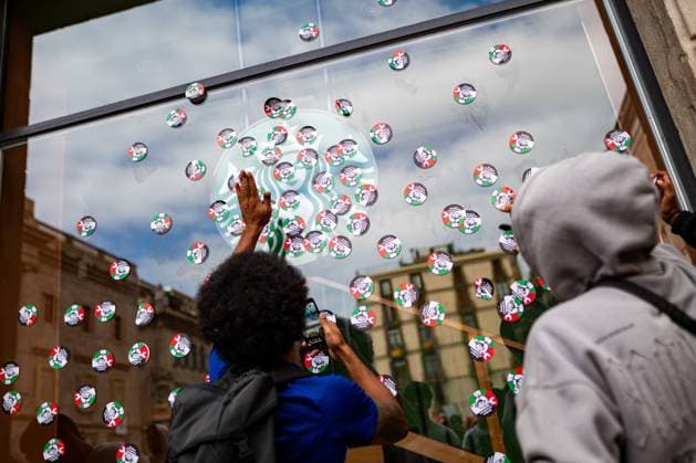 Students union demonstration in Barcelona in support of Palestine A boy sticks Palestinian flag stickers on a shop window during a Students union demonstration in support of the Palestinian people, Oct. 2, 2025, in Barcelona, Cataluna Spain The protest is called as part of the general student strike in support of the Palestinian people, in protest against Israels military intervention and the humanitarian crisis in Gaza 02 OCTOBER 2025 MANIFESTATION CONCENTRATION STUDENTS PALESTINIAN PROPALESTINIAN Lorena Sopê Barcelona Catalunya Barcelona Catalunya Spain  Copyright: xLorenaxSopÃªnax 6997648