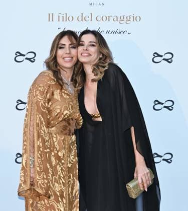Milan, Italy Il Filo del Coraggio fashion show event dedicated to women against violence by the Italian-Moroccan designer Hnia Harrati at the Fontana e Rocce of Palazzo Lombardia during Fashion Week. Celebrities, institutions and associations are present. In the photo: Hnia Harrati, Aida Yespica  Copyright: xNickxZonnax xipa-agency.netx xNickxZonnax IPA_Agency_IPA66058154