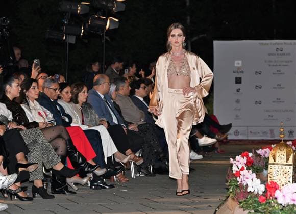 Milan, Italy Il Filo del Coraggio fashion show event dedicated to women against violence by the Italian-Moroccan designer Hnia Harrati at the Fontana e Rocce of Palazzo Lombardia during Fashion Week with the presence of personalities, institutions and associations. In the photo: fashion show with public and institutions present.  Copyright: xNickxZonnax xipa-agency.netx xNickxZonnax IPA_Agency_IPA66058202