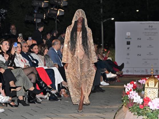 Milan, Italy Il Filo del Coraggio fashion show event dedicated to women against violence by the Italian-Moroccan designer Hnia Harrati at the Fontana e Rocce of Palazzo Lombardia during Fashion Week with the presence of personalities, institutions and associations. In the photo: fashion show with public and institutions present.  Copyright: xNickxZonnax xipa-agency.netx xNickxZonnax IPA_Agency_IPA66058209