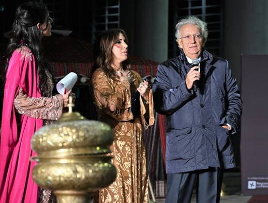Milan, Italy Il Filo del Coraggio fashion show event dedicated to women against violence by the Italian-Moroccan designer Hnia Harrati at the Fontana e Rocce of Palazzo Lombardia during Fashion Week. Celebrities, institutions and associations are present. In the photo: Hnia Harrati delivers a plaque of recognition to Magistrate Fabio Roja, President of the Court of Milan.  Copyright: xNickxZonnax xipa-agency.netx xNickxZonnax IPA_Agency_IPA66058261