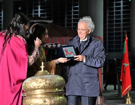 Milan, Italy Il Filo del Coraggio fashion show event dedicated to women against violence by the Italian-Moroccan designer Hnia Harrati at the Fontana e Rocce of Palazzo Lombardia during Fashion Week. Celebrities, institutions and associations are present. In the photo: Hnia Harrati delivers a plaque of recognition to Magistrate Fabio Roja, President of the Court of Milan.  Copyright: xNickxZonnax xipa-agency.netx xNickxZonnax IPA_Agency_IPA66058270