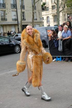 PFW - Paco Rabanne Outside Arrivals Carla Ginola wears a plastic clear coat with fur collar cuffs and trim, silver combat boots, silver and a gold metallic Rabanne bag Carla Ginola at Paco Rabanne show during the Womenswear Spring Summer 2026 as part of Paris Fashion Week on October 2, 2025 in Paris, France. Photo by Robin Psaila ABACAPRESS.COM Paris France  Copyright: xPsailaxRobin ABACAx