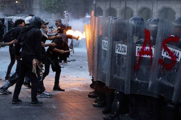 October 2, 2025, Mexico City, Mexico: Fifty-seven years after the massacre of students in Plaza Tlatelolco, survivors, students, and civil society at large marched toward Mexico City s ZoÂ³calo. The event included demonstrations in solidarity with the Palestinian people and clashes between police and some protesters. Mexico City Mexico - ZUMAl178 20251002_znp_l178_048 Copyright: xCristianxLeyvax