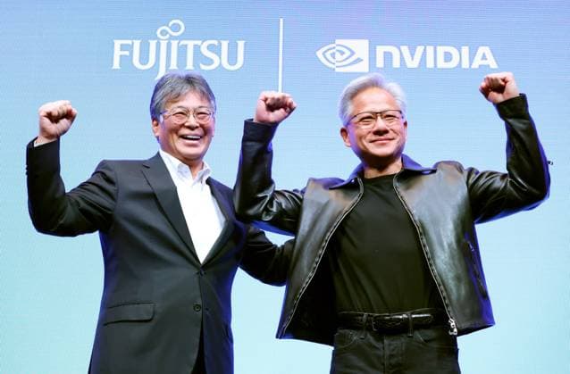 October 3, 2025, Tokyo, Japan - Japanese computer giant Fujitsu president Takahito Tokita (L) and American GPU and AI chip maker NVIDIA founder and CEO Jensen Huang (R) pose for photo as they announced to expand their strategic partnership for AI computing at a press conference in Tokyo on Friday, October 3, 2025. The collaboration will focus on co-developing of industrial AI agent platform such as healthcare, manufacturing and robotics sectors. (photo by Yoshio Tsunoda AFLO)  aflo_305707349