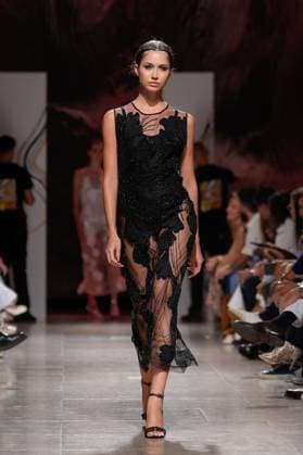 October 4, 2025, Lisbon, Portugal: A model walks the runway during Carlos Gil fashion show at ModaLisboa Base, Lisbon Fashion Week in Lisboa. Lisbon Portugal - ZUMAs197 20251004_aaa_s197_620 Copyright: xBrunoxdexCarvalhox
